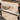 Two Construction Workers Carrying a Timber Beam