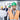 Architect smiling wearing a suit, hardhat and hi-vis vest